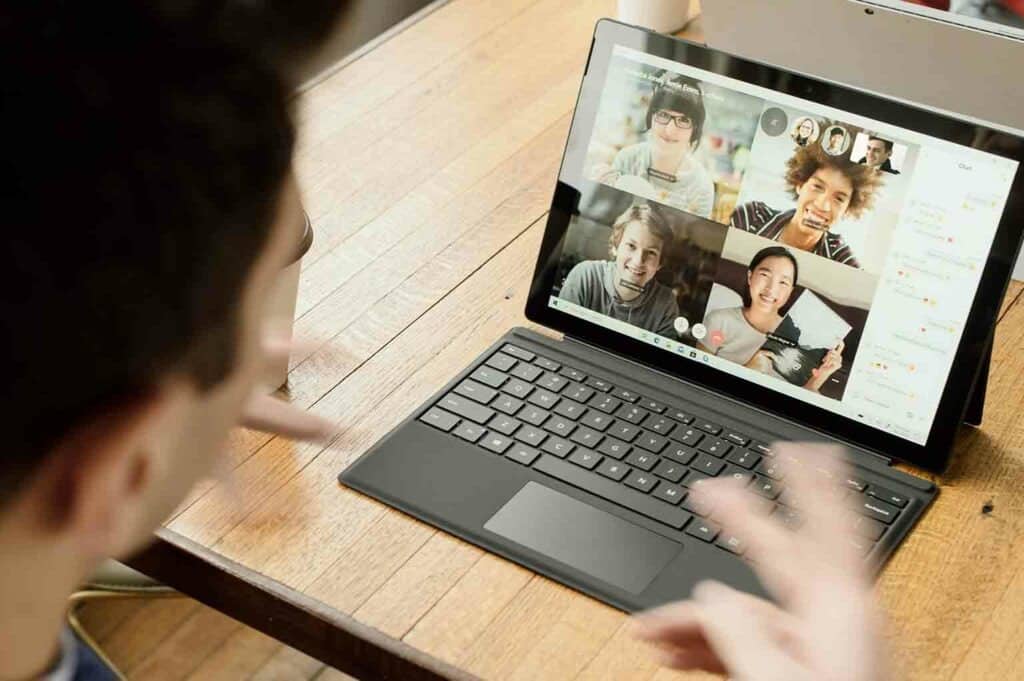 Team coaching via video call on a computer